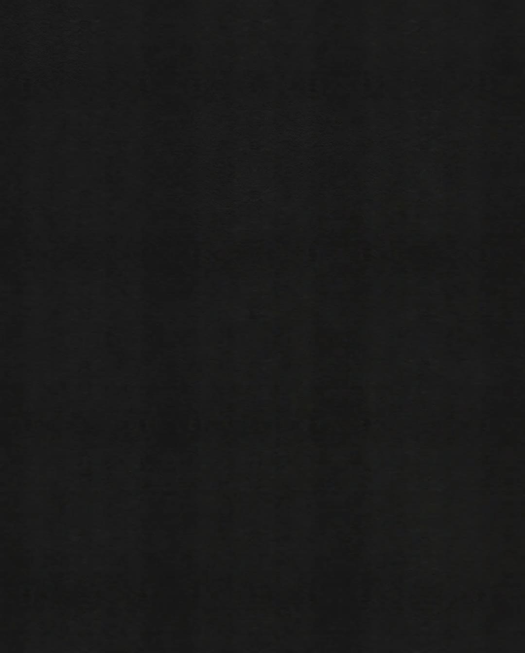 A blank black sheet, about to become Dariel Gomez